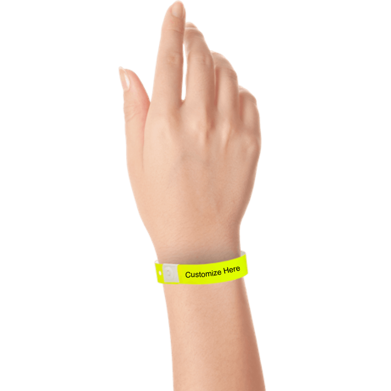 hand wearing plastic regular 3/4" wristband with a placeholder to show where you can customize the wristband in neon yellow