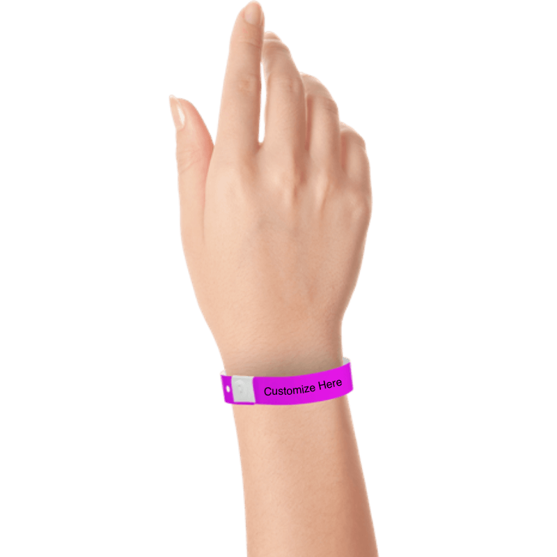 hand wearing plastic regular 3/4" wristband with a placeholder to show where you can customize the wristband in pantone purple