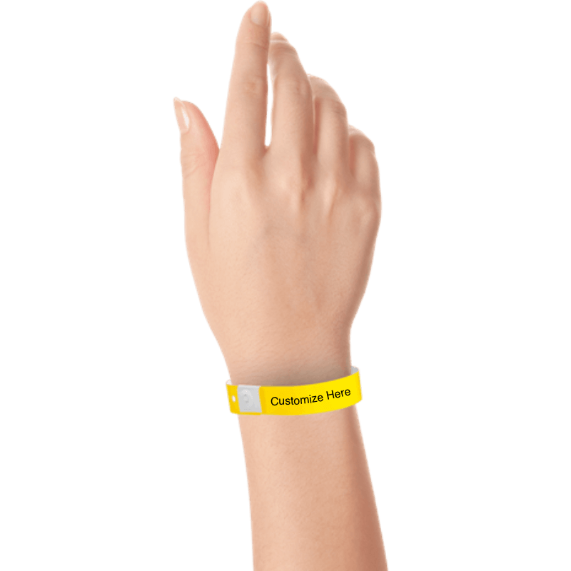 hand wearing plastic regular 3/4" wristband with a placeholder to show where you can customize the wristband in pantone yellow