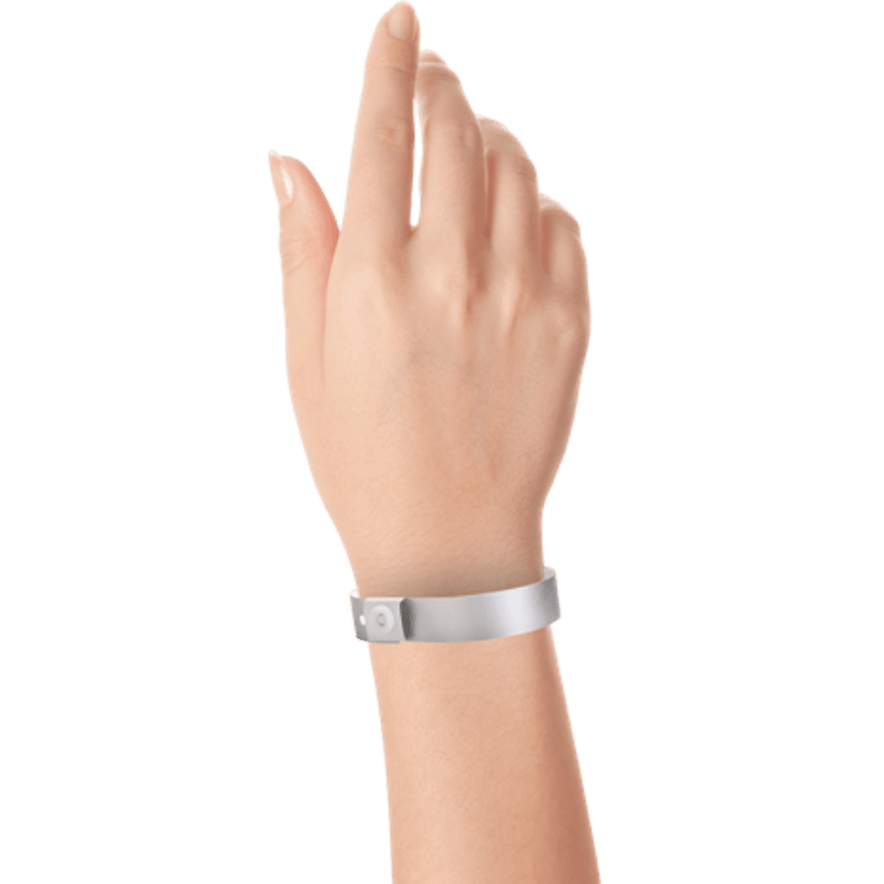 silver plastic regular 3/4" solid wristband on hand