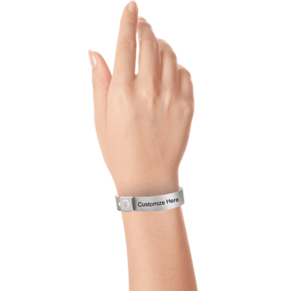 hand wearing plastic regular 3/4" wristband with a placeholder to show where you can customize the wristband in silver