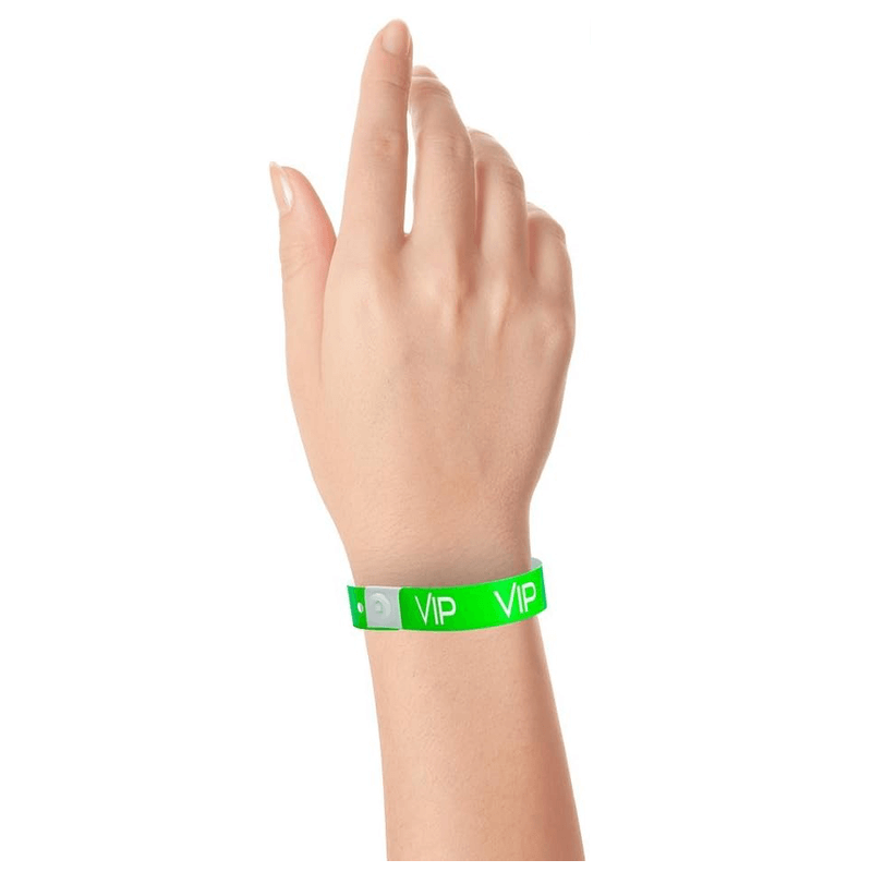 VIP plastic wristband on hand in neon green
