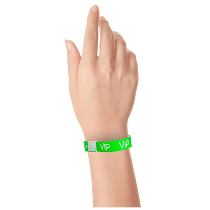 VIP plastic wristband on hand in neon green