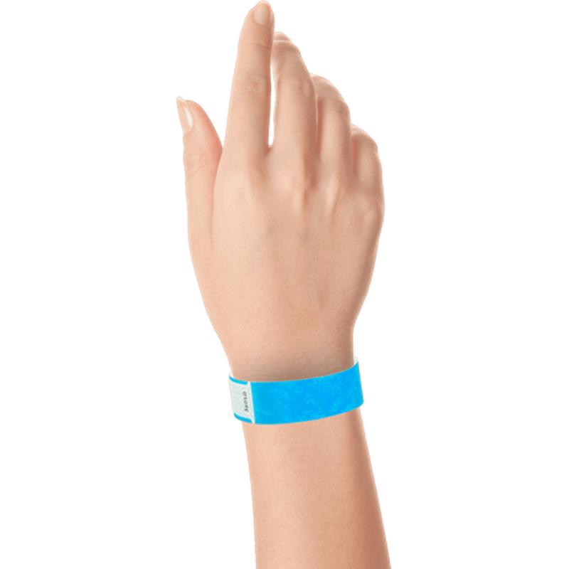 hand wearing tyvek 3/4" solid qwik fit wristband in neon blue