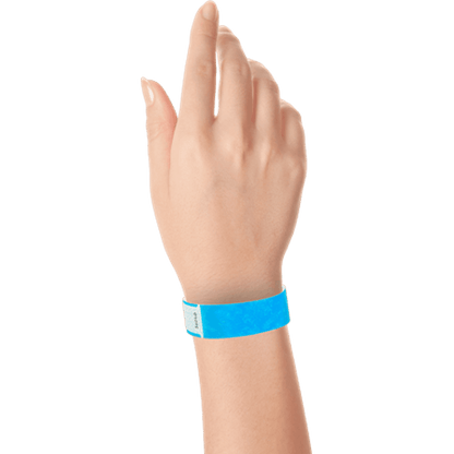 hand wearing tyvek 3/4" solid qwik fit wristband in neon blue