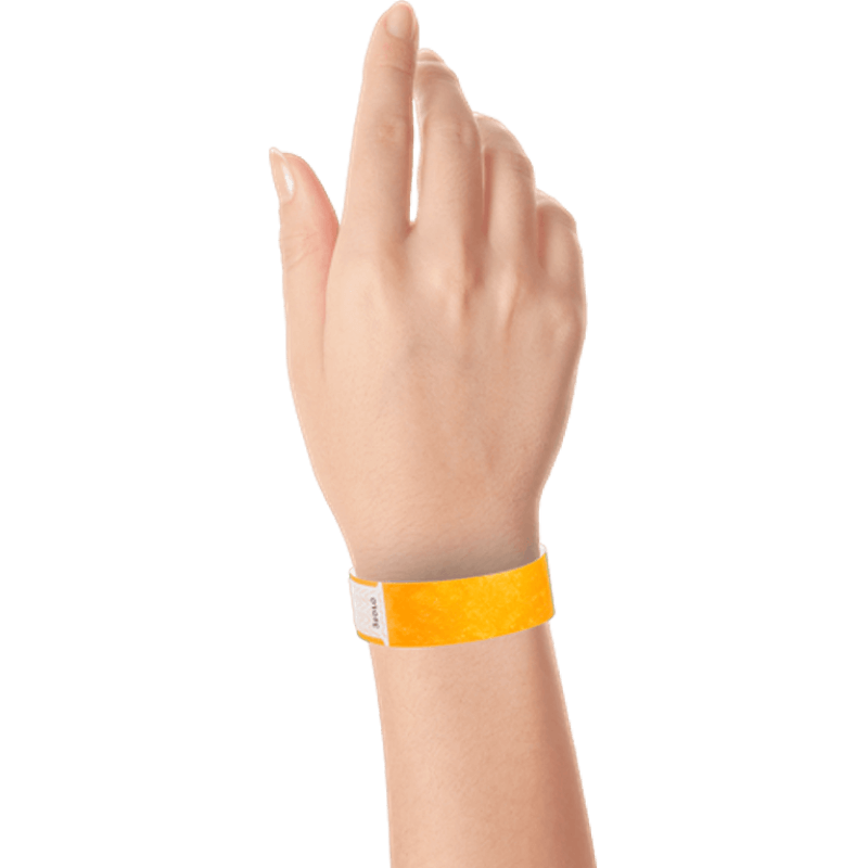 hand wearing tyvek 3/4" solid qwik fit wristband in neon orange