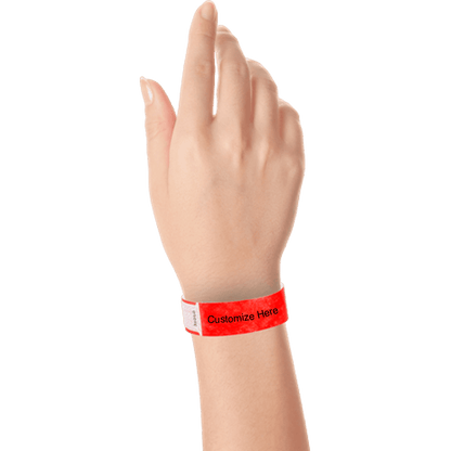 hand wearing tyvek 3/4" solid qwik fit wristband showing a placeholder for customization in neon red