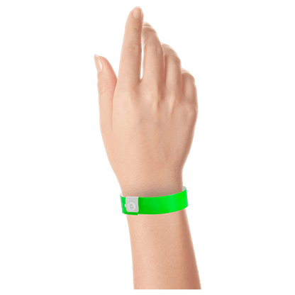 Regular vinyl wristband on hand in neon green