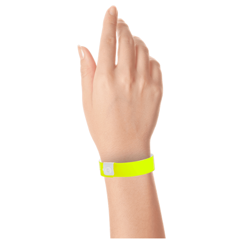 Regular vinyl wristband on hand in neon yellow