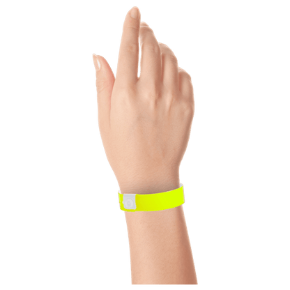 Regular vinyl wristband on hand in neon yellow