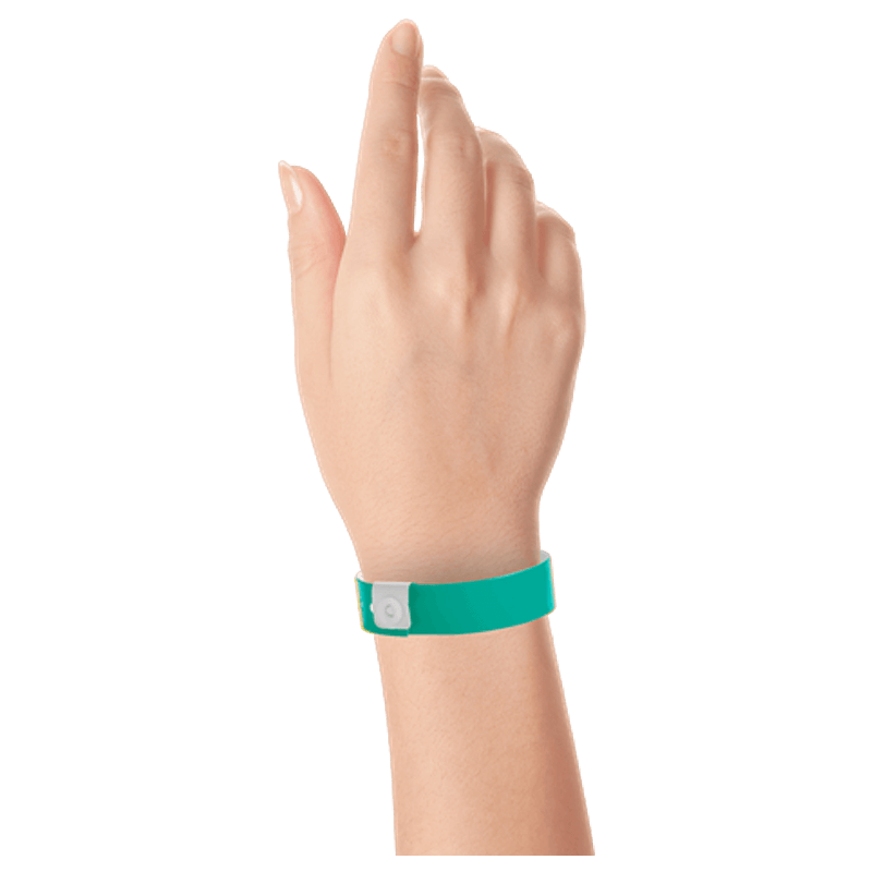 Regular vinyl wristband on hand in teal