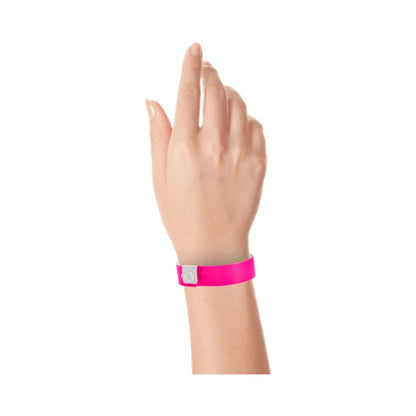 vinyl regular wristband in pink - shown on wrist