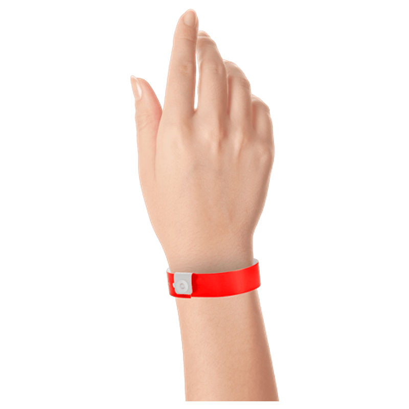 Regular vinyl wristband on hand in neon red