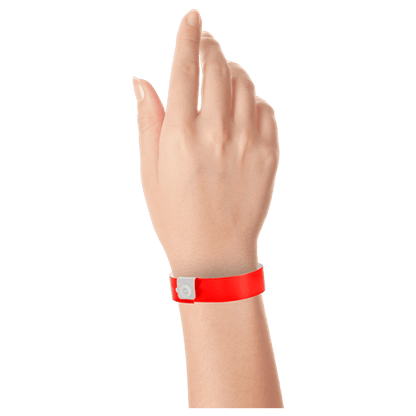 Regular vinyl wristband on hand in neon red