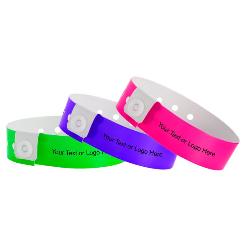 regular vinyl wristbands with a placeholder to show where you can customize the wristband in neon green, purple and neon pink 