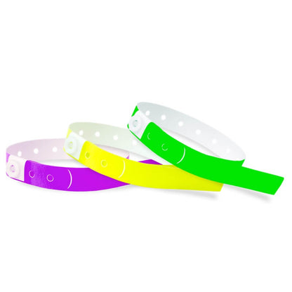 slim plastic wristbands shown in pantone purple, neon yellow and neon green