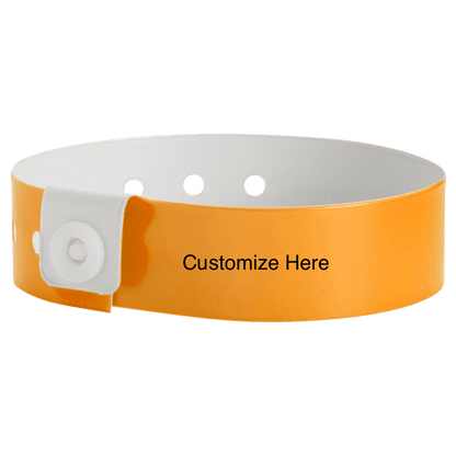 Slim vinyl wristbands with a placeholder to show where you can customize the wristband shown in neon orange