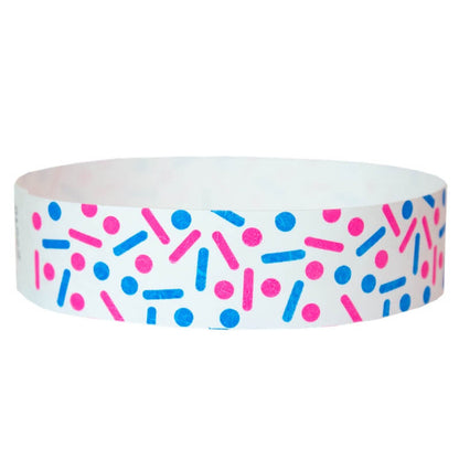 white tyvek wristband with neon pink and neon blue dots and lines - sprinkles - round version shown
