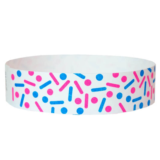 white tyvek wristband with neon pink and neon blue dots and lines - sprinkles - round version shown