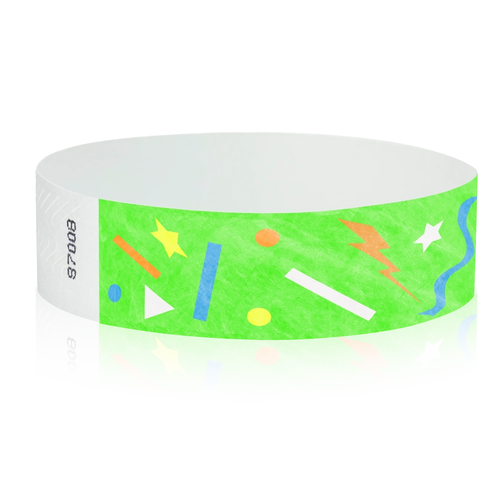 neon green wristband with geometric shapes in neon blue, neon orange, neon yellow and white - round version shown