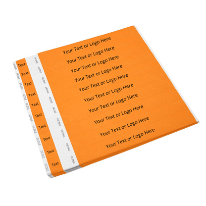 Showing sheets of tyvek 1" detachable stub wristbands in neon orange
