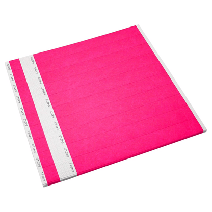 tyvek 1" detachable stub wristbands shown in neon pink sheets