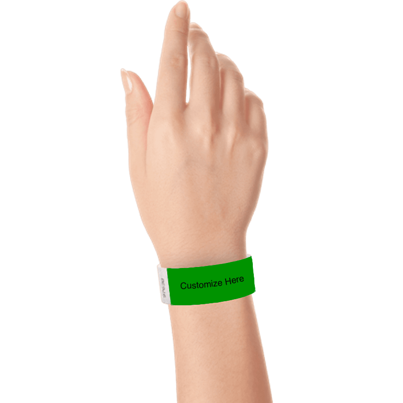 hand wearing a kelly green tyvek 1" solid wristband with a placeholder to customize with your text or logo