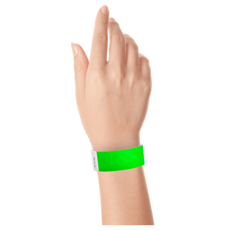 neon green tyvek 1" solid wristband on hand