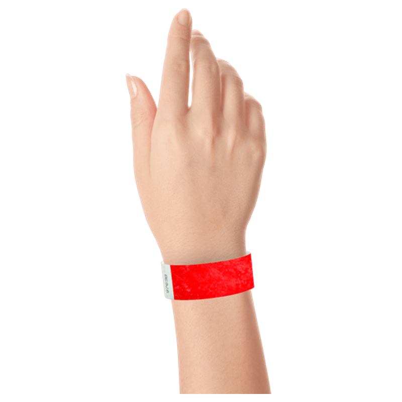 neon red tyvek 1" solid wristband on hand