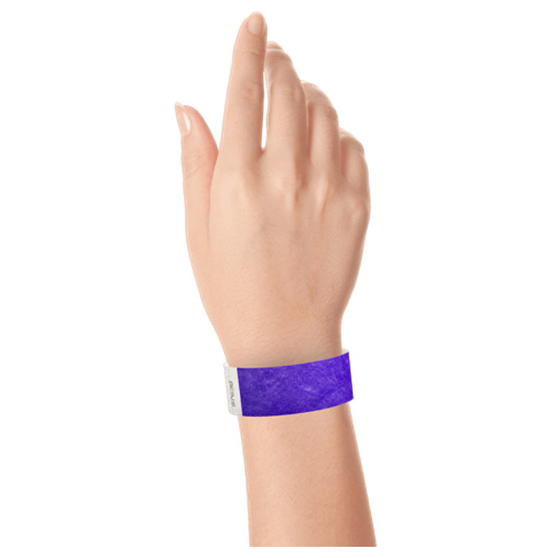purple tyvek 1" solid wristband on hand