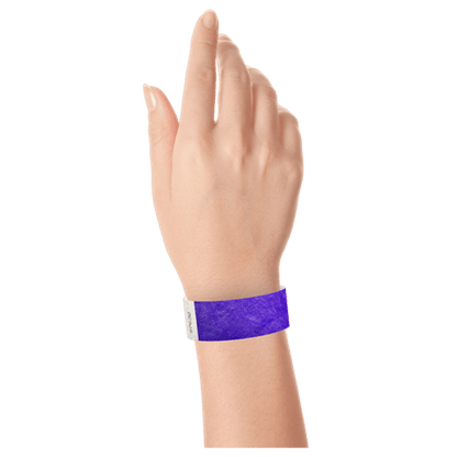 purple tyvek 1" solid wristband on hand