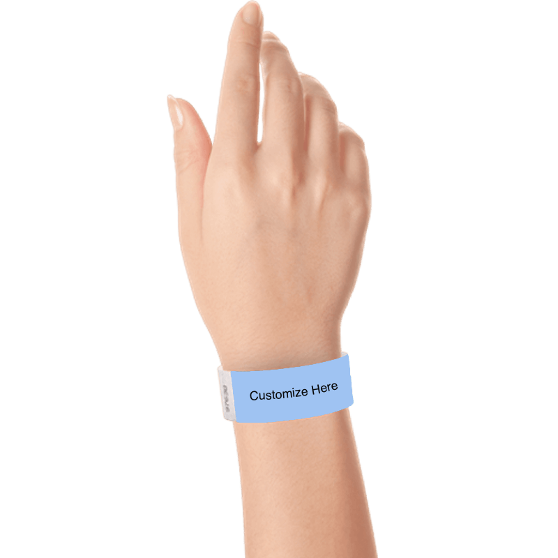 hand wearing a sky blue tyvek 1" solid wristband with a placeholder to customize with your text or logo