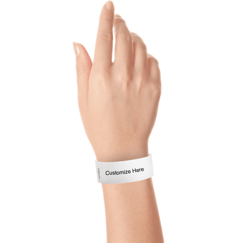 hand wearing a white tyvek 1" solid wristband with a placeholder to customize with your text or logo