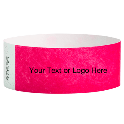neon pink tyvek 1" solid wristband with a placeholder to customize with your text or logo