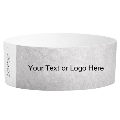 silver tyvek 1" solid wristband with a placeholder to customize with your text or logo