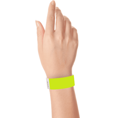 lime green tyvek 1" solid wristband on hand 