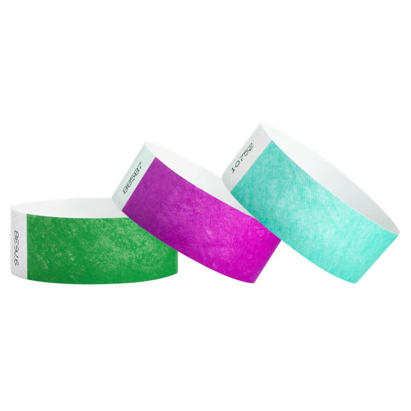 tyvek 1" wristbands shown in kelly green, pantone purple and aqua