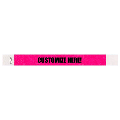 Tyvek 1" wristband in solid neon pink with black text "CUSTOMIZE HERE!" - shown in flat 