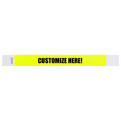 Tyvek 1" wristband in solid neon yellow with black text "CUSTOMIZE HERE!" - shown in flat 