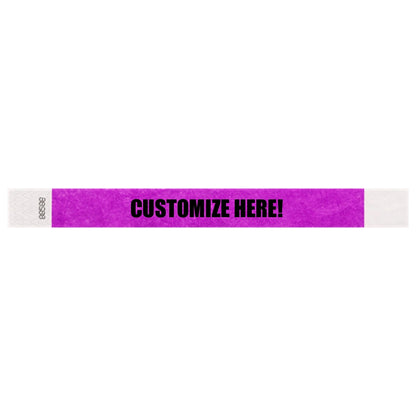 Tyvek 1" wristband in solid pantone purple with black text "CUSTOMIZE HERE!" - shown in flat 