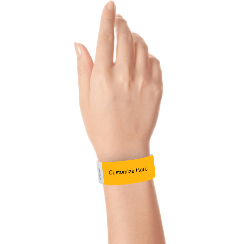 hand wearing a goldenrod tyvek 1" solid wristband with a placeholder to customize with your text or logo