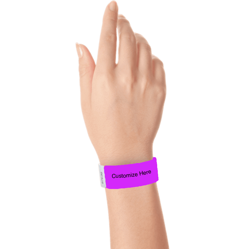 hand wearing a pantone purple tyvek 1" solid wristband with a placeholder to customize with your text or logo 