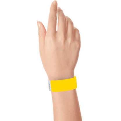pantone yellow tyvek 1" solid wristband on hand 