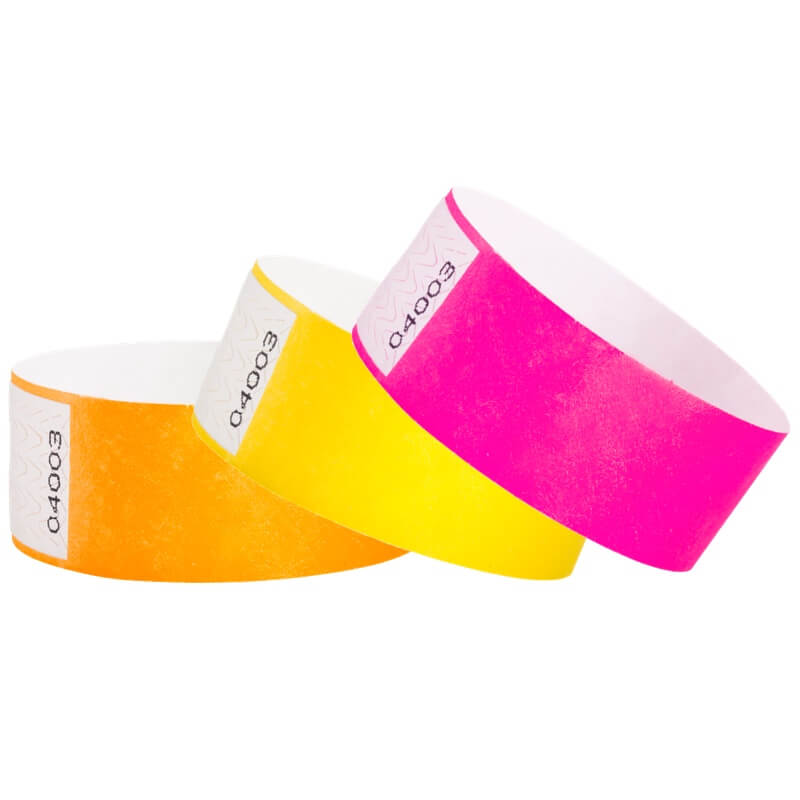 tyvek 1" qwik fit wristbands - shown in neon orange, pantone yellow and neon pink