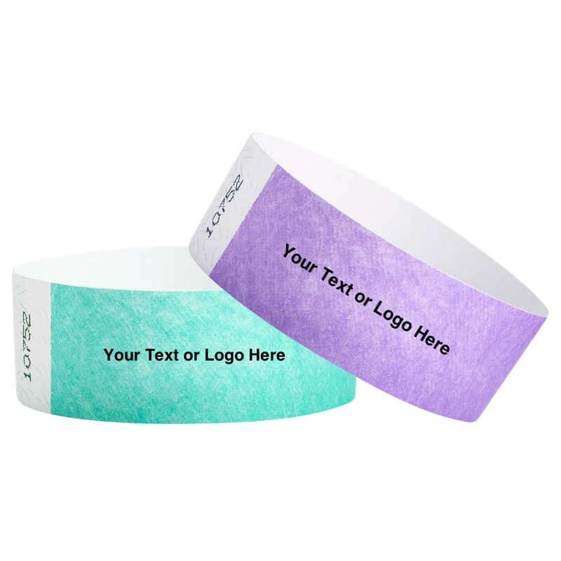 Two customizable tyvek 1" wristbands with text or logo placeholder 
