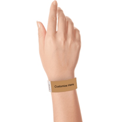 hand wearing a mocha tyvek 1" solid wristband with a placeholder to customize with your text or logo