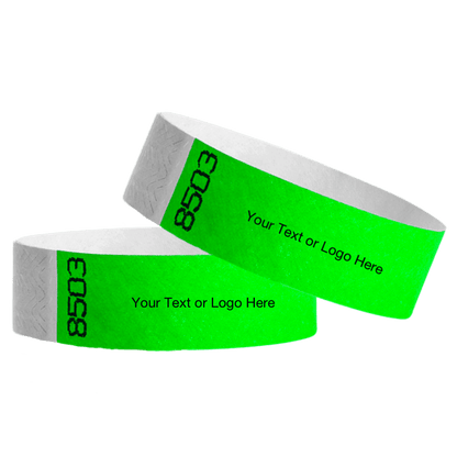 two neon green tyvek 3/4" wristbands showing duplicate numbers with a placeholder to customize your text or logo