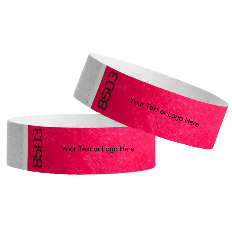 two neon pink tyvek 3/4" wristbands showing duplicate numbers with a placeholder to customize your text or logo