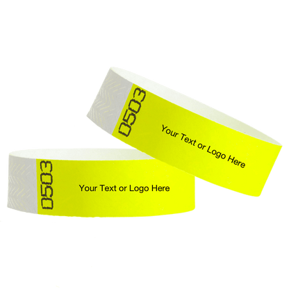 two neon yellow tyvek 3/4" wristbands showing duplicate numbers with a placeholder to customize your text or logo