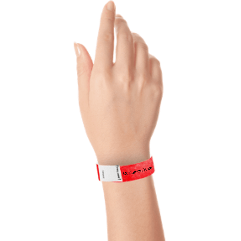 hand wearing a neon red tyvek 3/4" litter free wristband with a placeholder for customizing with your text or logo